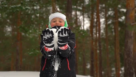  Boy, child throws snow up Stock Footage 88921611