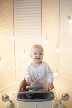 The boy in the children's machine. Stock-Fotos