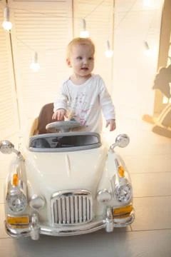 The boy in the children's machine. 写真素材