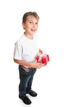 Boy with Christmas present Stock Photos