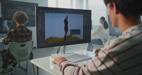 Boy in Classroom Works on 3D Modeling Project at Computer Stock Footage 318526398