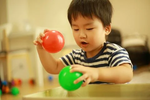 Boy cleaning up Stock Photos