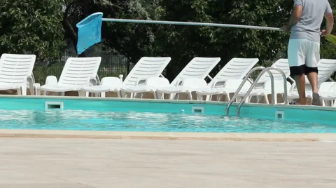 Boy Cleaning the Pool Stock Footage 51016441
