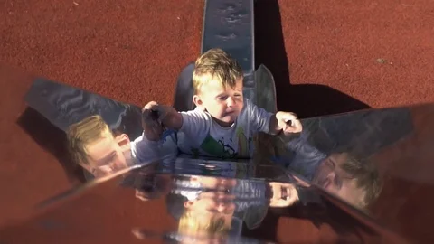 Boy Climb The Slide And Fall Off Stock Footage 79976258