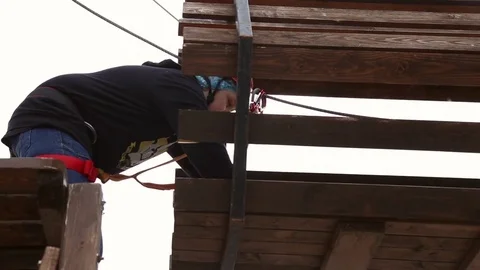 Boy in climbing equipment Stock Footage 76777015