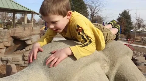 Boy climbing playground Stock Footage 50123443
