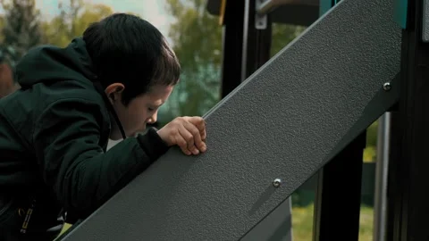 Boy Climbing up Playground Structure Stock Footage 309032775