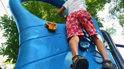 Boy climbing to the wall Stock Footage 196179896