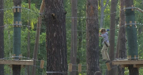 A boy climbs Stock Footage 52549830