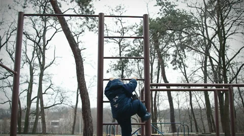 Boy climbs up the stairs Stock Footage 35044853