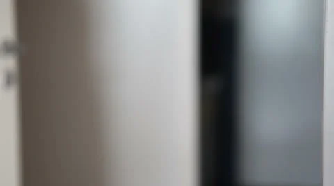Boy closes the door close-up Video stock 58867081