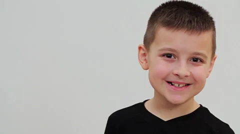 Boy closeup shows different emotions Stock Footage 62958288