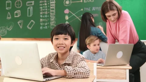 Boy coding engineering prompt while attractive girl drawing picture. Pedagogy. Stock Footage 270322137