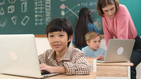 Boy coding engineering prompt while attractive girl drawing picture. Pedagogy. Stock Footage 273611794