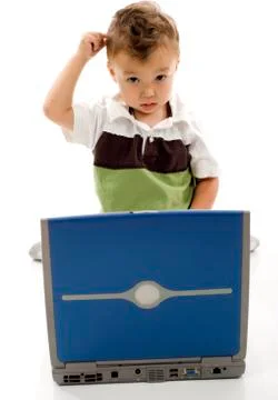 Boy with computer Stock Photos