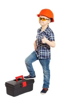 Boy in the construction helmet Stock Photos