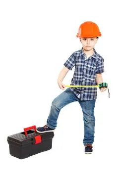Boy in the construction helmet Stock Photos