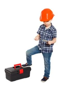 Boy in the construction helmet Stock Photos