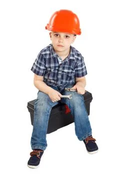 Boy in the construction helmet Stock Photos