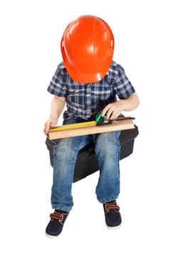 Boy in the construction helmet Stock Photos