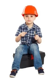 Boy in the construction helmet Stock Photos