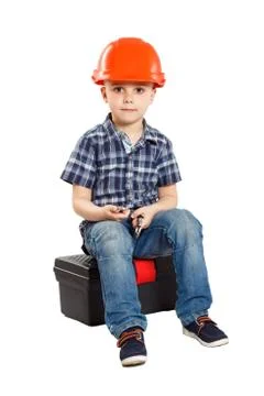 Boy in the construction helmet Stock Photos