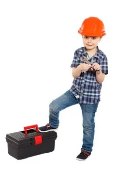 Boy in the construction helmet Stock Photos