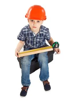 Boy in the construction helmet Stock-Fotos