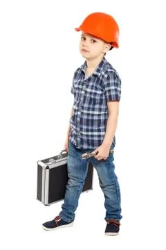 Boy in the construction helmet Stock Photos