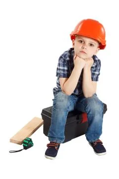 Boy in the construction helmet Foto stock