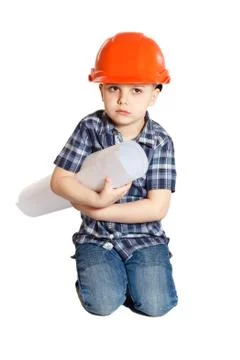 Boy in the construction helmet Stock Photos