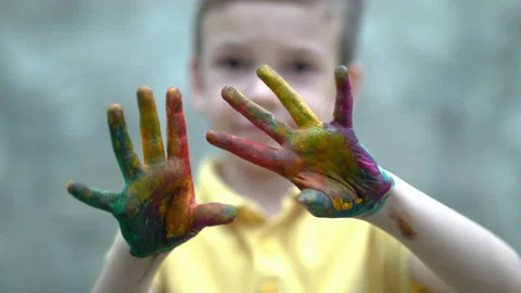 Boy covered in finger paint. Stock Footage 158898811