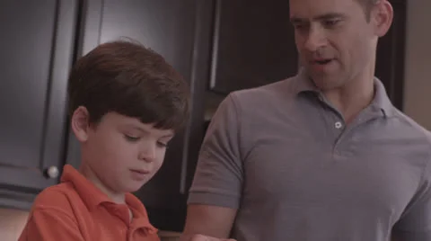 Boy Cracking an Egg Video stock 25934220