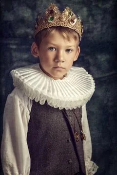 Boy in the crown Stock Photos