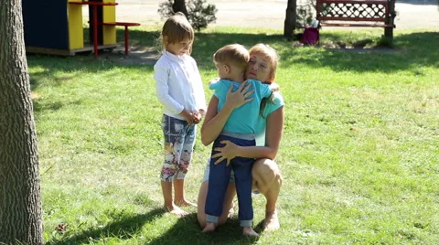The boy is crying and his mother calms Stock Footage 52436267
