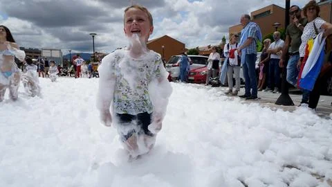 A boy crying at the foam party Stock Photos