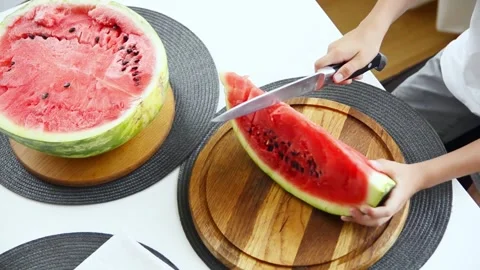 Boy Cutting Fresh Watermelon Into Pieces Stock Footage 341812055