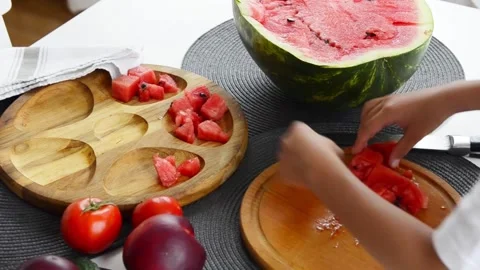 Boy Cutting Fresh Watermelon Into Pieces Stock-Footage 341812165
