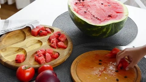 Boy Cutting Fresh Watermelon Into Pieces Stock Footage 341812208