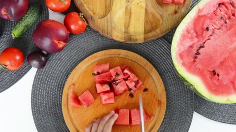Boy Cutting Fresh Watermelon Into Pieces Stock Footage 341812383