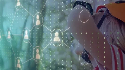 Boy cyclist raising gloved hand in woods initiating tech network overlaying left Stock Footage 333256143