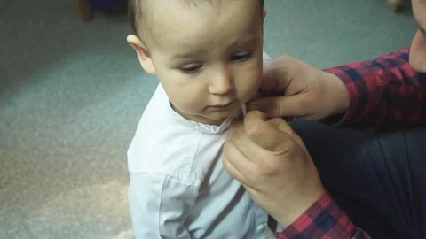 Boy Daddy Button Butterfly Dress Video stock 73961297