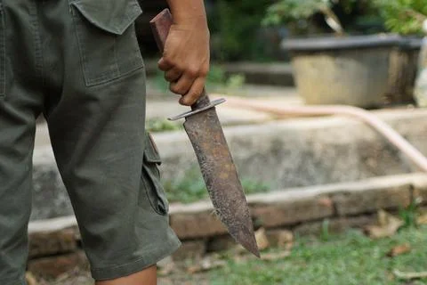 Boy with a dagger Stock Photos