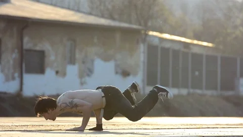 Boy dancing breakdance on the street. Stock Footage 74125008