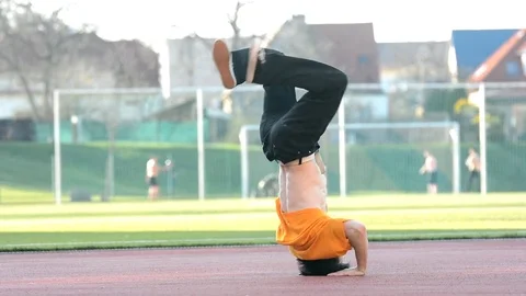 Boy dancing breakdance on the street. Video stock 74125021