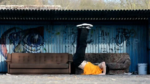 Boy dancing breakdance on the street. Stock Footage 74125023