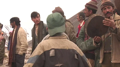 Boy dancing on dafli beat in festival in Broghil Stock Footage 202886853