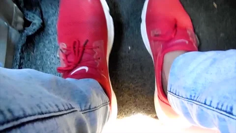 Boy dancing with his feet in red shoes Stock Footage 204922946