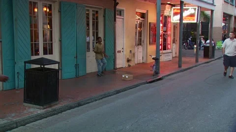 Boy dancing on sidewalk at Bourbon Street Stock Footage 54593274