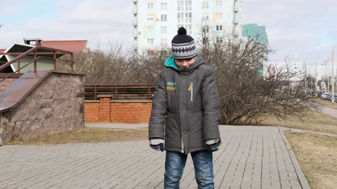 Boy dancing in the street Stock Footage 106096847